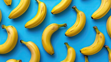A bunch of bananas are arranged in a pattern on a blue background