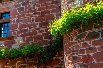Collonges-la-Rouge village, one of the most beautiful villages in France with houses made from red stones, tourists destination in Dordogne