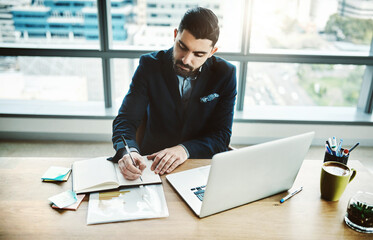 Laptop, writing notes and businessman in office for financial analysis, company review and data analytics. Corporate, consultant and person with notebook and computer for research, website and report