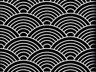 A monochrome pattern with undulating waves, creating a visually captivating black and white design