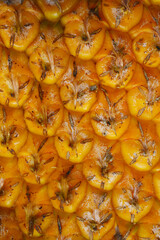 closeup background of orange pineapple skin