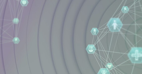 Image of globes of medical icons spinning over concentric circles on white background