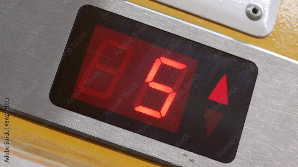 Poster display in elevator showing change of floors