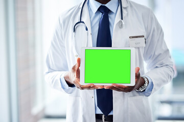 Green screen, tablet and hands of doctor at hospital with mockup for healthcare, help or questions. Digital, space and man surgeon at clinic with how to, steps or Telehealth consulting app sign up