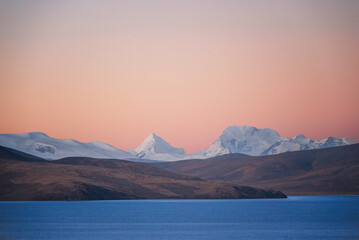 The sunrise of Kangphu Kang II / Dophu Kang and Pumoyum Co lake in Tibet