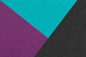 Fototapeta premium Texture of craft purple, turquoise and black shade color paper background, macro. Vintage abstract cardboard