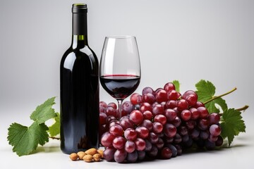 Obraz premium Red wine bottle with wine grapes,isolation white background