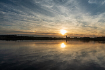 Sunset above Karvinske more lake near Karvina city in Czech republic