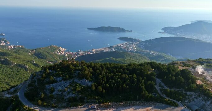 Establishing drone shot the of Bečići city from the mountains, in Montenegro