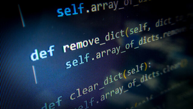 Close-up programming code on the screen with a macro