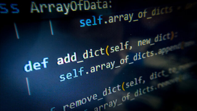 Close-up programming code on the screen with a macro