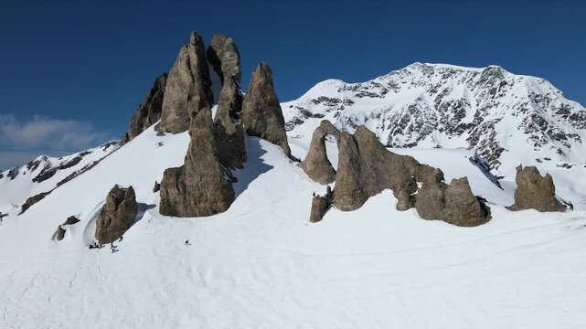 Tignes ski resort and Aiguille Perc&eacute;e rock formation during a blue sky winter day