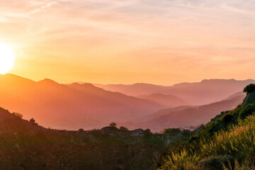 beautiful scenic sunset landscape of a canyon between two mountains