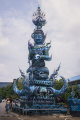 Obraz premium An ancient Buddhist statue at blue temple in Thailand