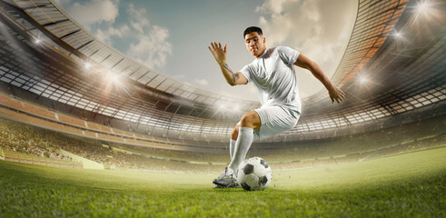 Soccer player dressed uniform skillfully controls ball on field, with focused expression. Stadium lights illuminate scene, highlighting player's athletic prowess Concept of sports games, tournament.