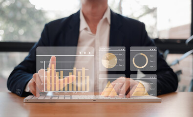 Businessman show investment growth graph chart and analysing growth achievement diagram data...