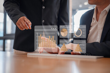 Businessman show investment growth graph chart and analysing growth achievement diagram data...