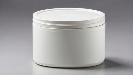 a white, round, plastic container with a lid