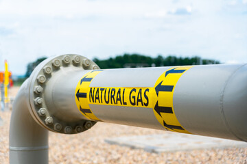 High pressure transport pipe showing natural gas and flow direction