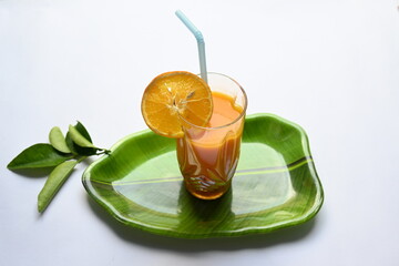 Fresh Orange juice on white background. It is a famous fruit juice which contains lots of vitamins like vitamin C, folate and potassium. Healthy drink. Fruit juice.
