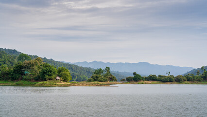 Scenic landscape panorama on picturesque Kaptai lake under moody sky, Rangamati, Chittagong, Bangladesh	
