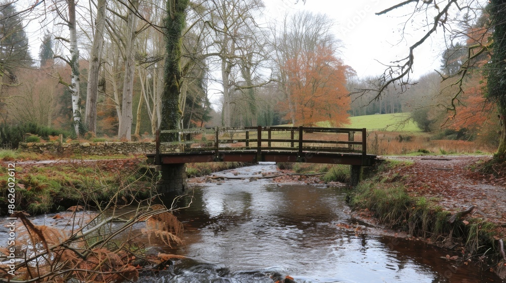 Poster quaint little bridges span across winding rivers and streams adding to the charm of the countryside 