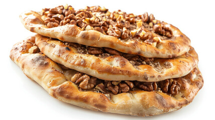 Fototapeta premium Thin Turkish flatbread topped with walnuts, isolated on white background.