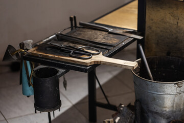 Tools are placed in a glass blowing workshop