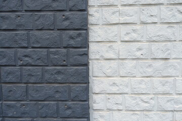 Backdrop - black and white concrete brick veneer wall