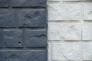 Closeup of black and white concrete brick veneer wall
