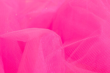 Fuchsia color tulle texture. Background, texture.