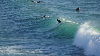 Surfing / Riding waves at Banana Beach Agadir Morocco