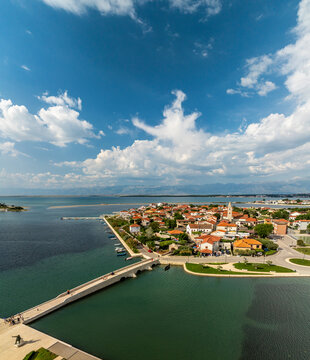 Aerial view of scenic coastal town Nin with historic buildings and bridge, Zadar County, Croatia.