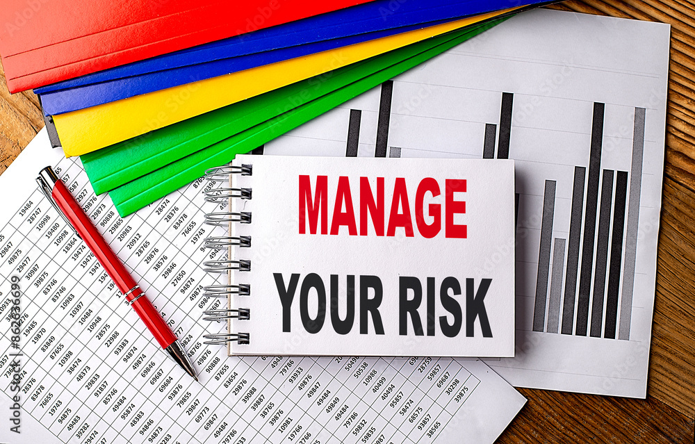 Poster mange your risk text on notebook with folder on chart