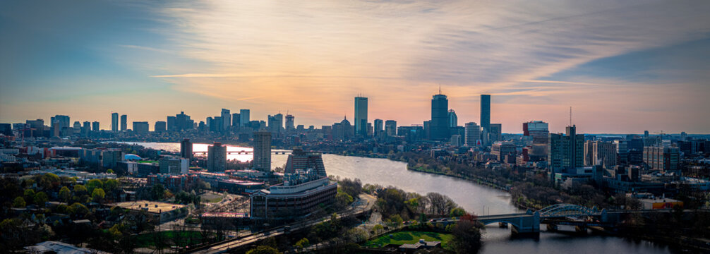 Aerial view of urban skyline with charles river and city lights, boston, massachusetts, united states.
