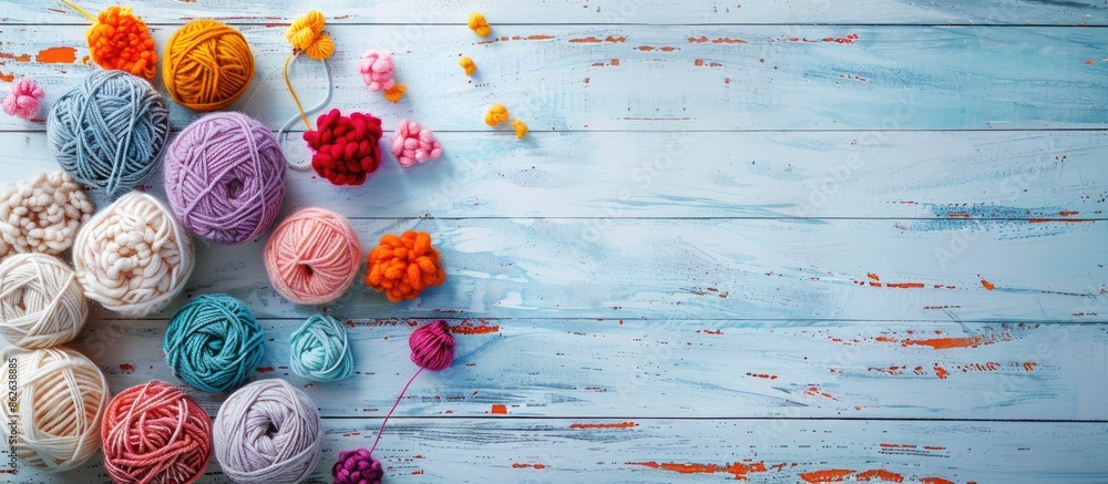 Poster various colorful yarn balls and embroidery items displayed on a white wooden table with a textured s