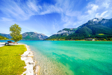 View of Lake Achensee in Tyrol. Nature at the turquoise lake and a mountain landscape in the...