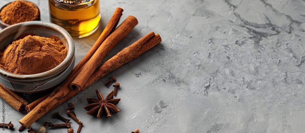 Poster cinnamon oil for various uses like cooking, aromatherapy, and skincare, displayed alongside cinnamon