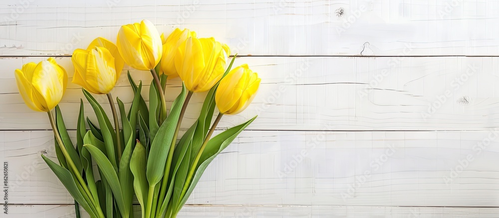 Aufkleber yellow tulip bouquet on white wood backdrop with copy space image. perfect for various occasions lik