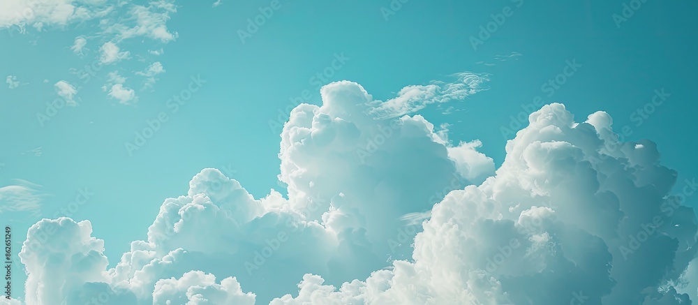 Aufkleber copy space image of a serene blue sky with fluffy clouds in the background.