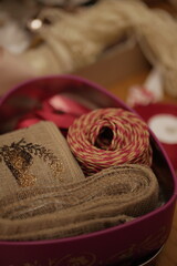 christmas and new year holidays. magical atmosphere. packaging and ribbons for gifts in box
