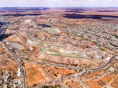 Aerial view of Broken Hill mine, town, roads, buildings, hills, terrain, New South Wales, Australia.