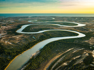Aerial view of winding river at sunset, Gulf of Carpentaria, Queensland, Australia.