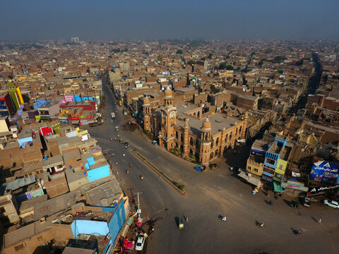 Aerial view of Multan cityscape with historic buildings and bustling marketplace, Punjab, Pakistan.