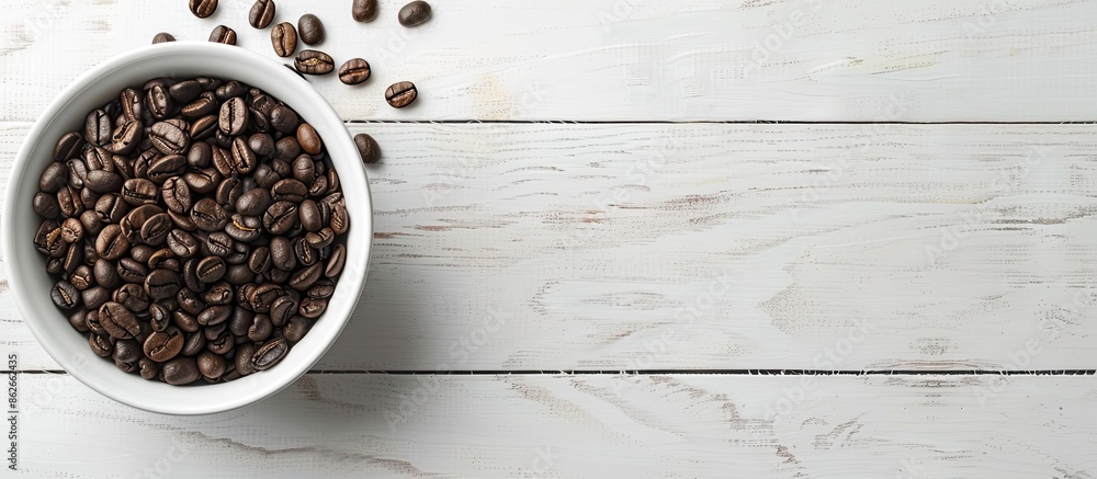 Poster coffee beans in bowl with coffee maker on a wooden surface, set against a white paper background in 