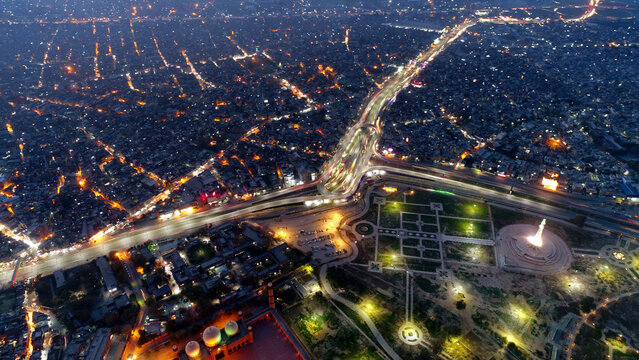 Aerial view of Walled city with Minar e Pakistan monument and city lights, Lahore, Pakistan.