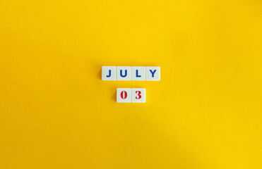 July 03 Banner. Concept of Celebrating Anniversary, Birthday, Jubilee, Big Day. Text on Block Letter Tiles and Icon on Flat Background. Minimalist Aesthetics.