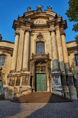 Obraz premium Ukraine, Lviv - August 10, 2016: panoramic view of historical old city district. Dominican Cathedral Church of the Holy Eucharist now .