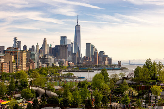 View of urban skyline with hudson river and park, new york, united states.