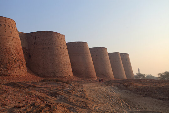View of ancient Multan Fort at sunset with people, Multan, Pakistan.